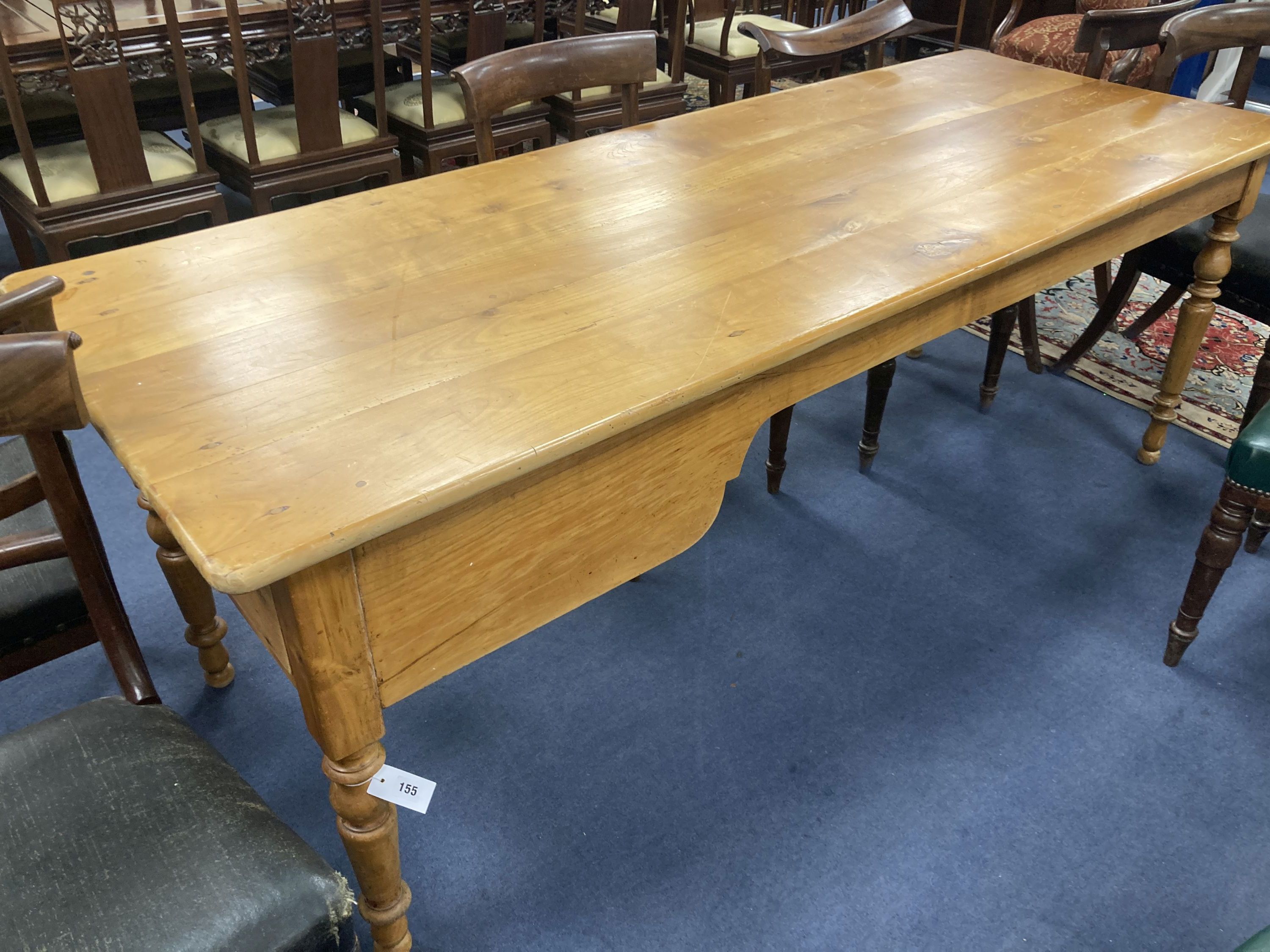 A 19th century French walnut farmhouse table, fitted with one deep and one shallow frieze drawer, length 208cm, depth 76cm, height 75cm